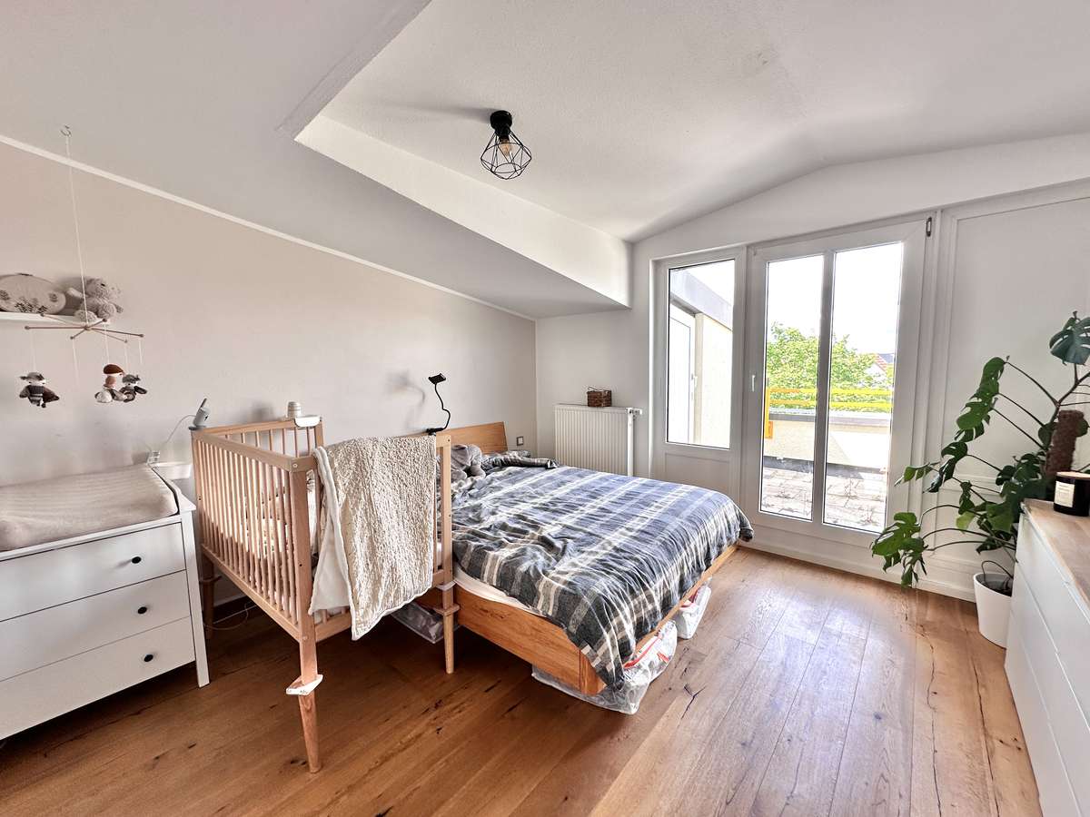 Schlafzimmer TRAUMHAFTE 3-Zi. Dachterrassenwohnung “AM Weiher” in USH