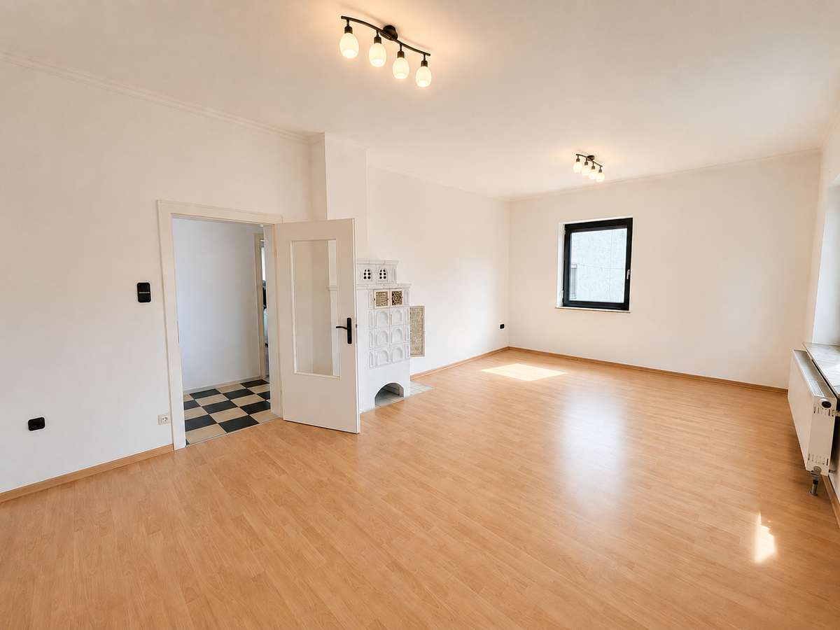 Wohnzimmer Ihr neues Familienzuhause – 3 Zi. Whg. mit Garten zum Wohlfühlen