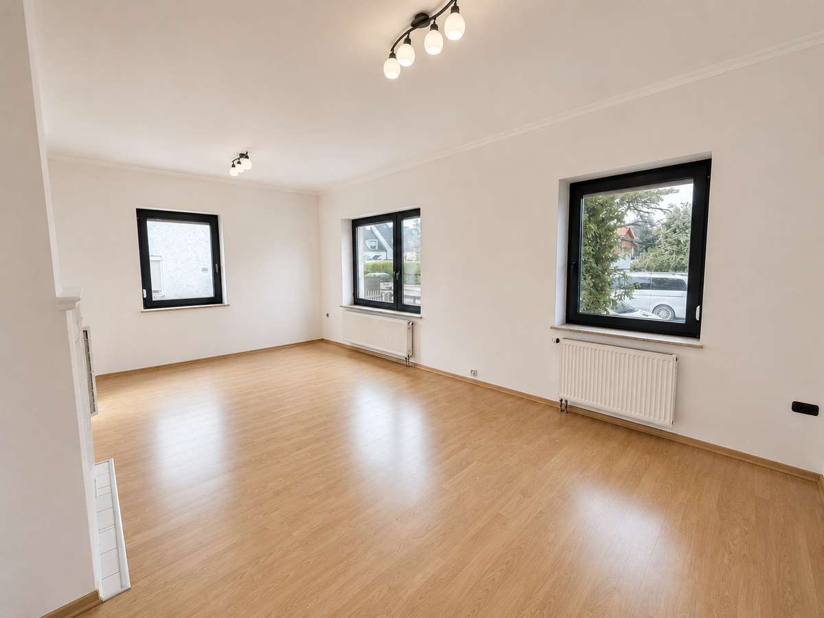 Wohnzimmer Ihr neues Familienzuhause – 3 Zi. Whg. mit Garten zum Wohlfühlen