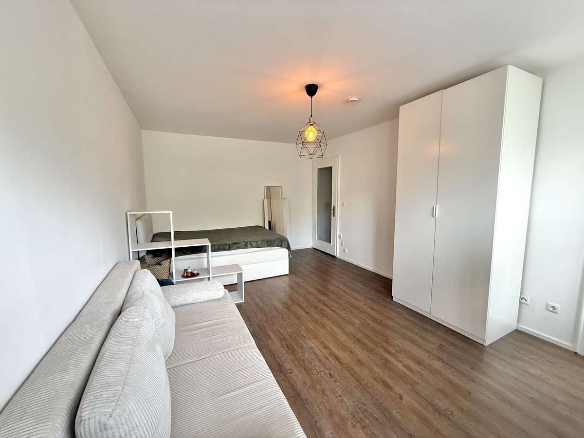 Wohn- und Schlafzimmer Sonnige und ruhige 1-Zi. Whg. mit großem Westbalkon und Blick ins Grüne