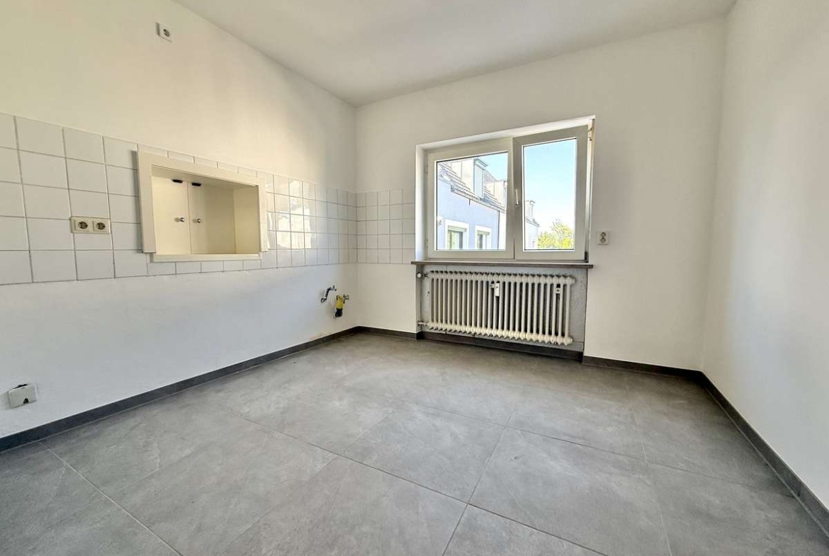 Helle 3-Zimmer-Wohnung mit Balkon in ruhigem 3-Parteien-Haus in Unterschleißheim