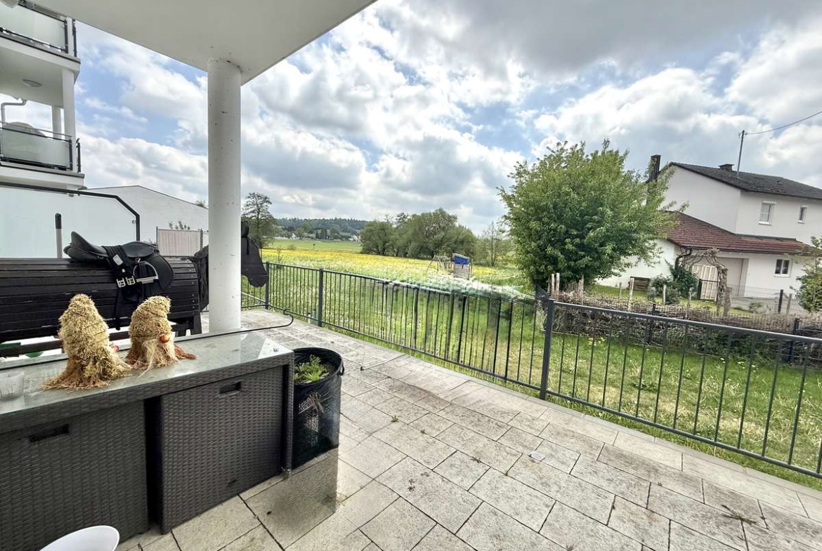 NEUWERTIGE  4-Zi.-Wohnung in Hettenshausen mit sonnige Südterrasse