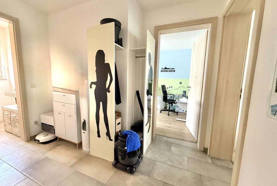 NEUWERTIGE  4-Zi.-Wohnung in Hettenshausen mit sonnige Südterrasse
